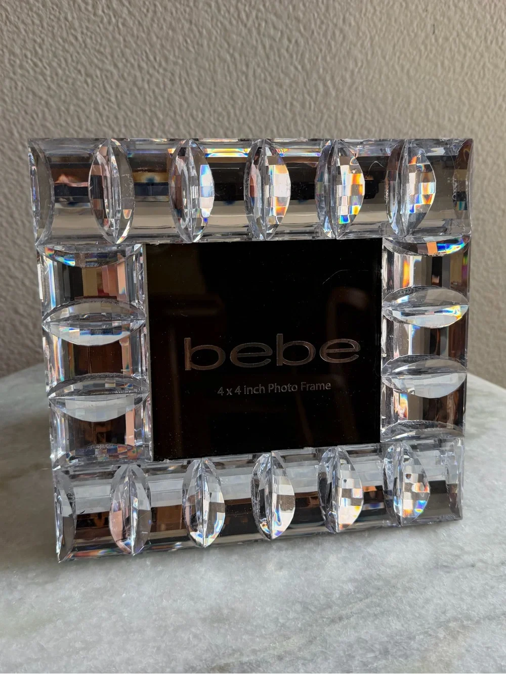 bebe silver tone